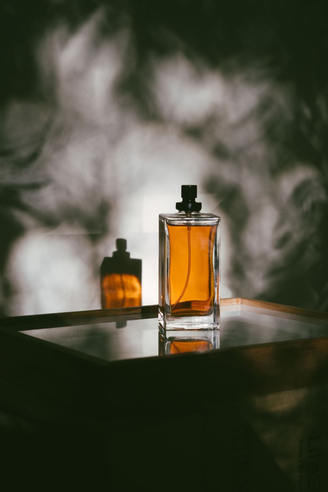 A premium perfume bottle photographed in soft studio light